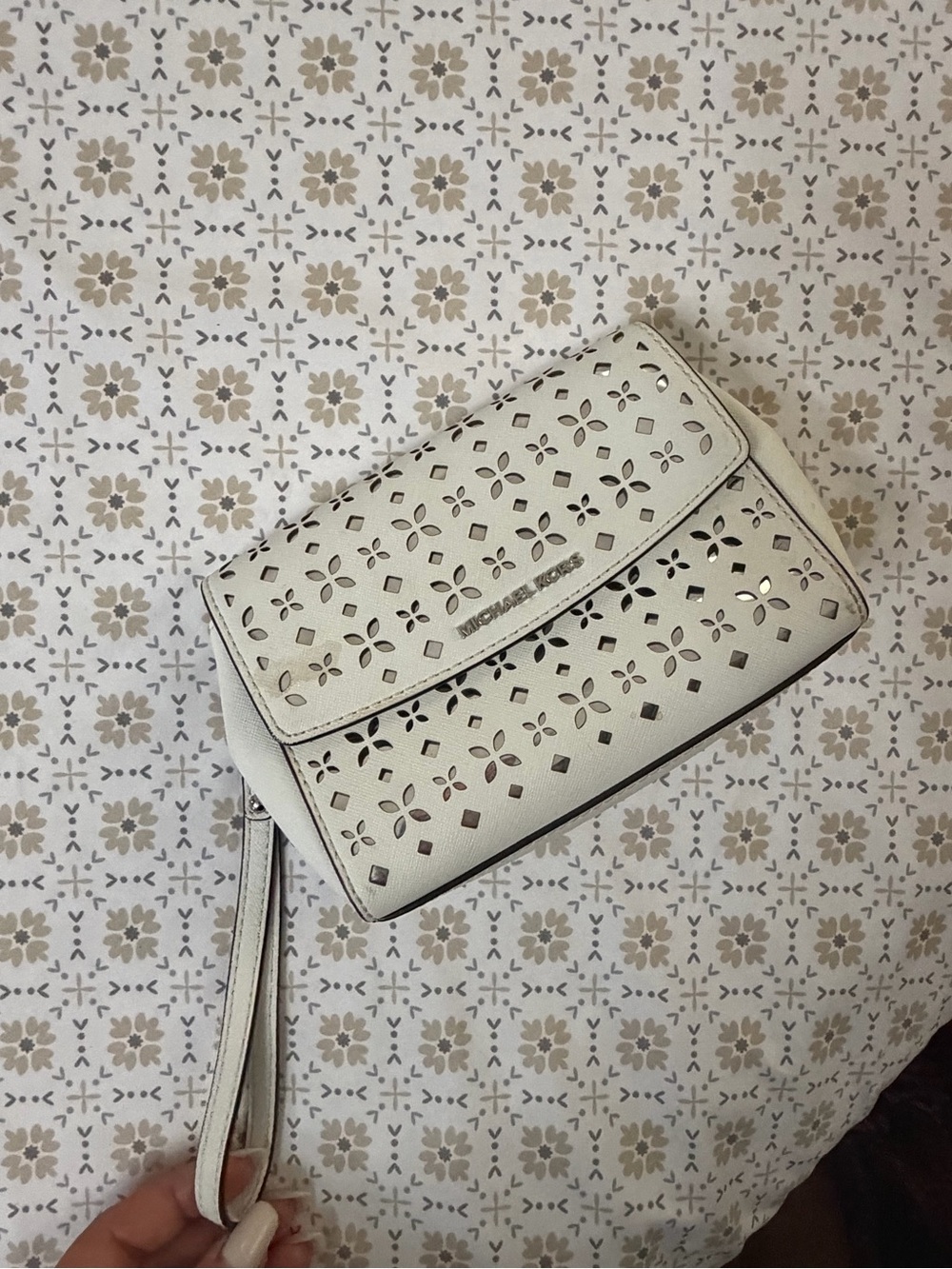 Michael Kors Ivory Perforated Wristlet Clutch